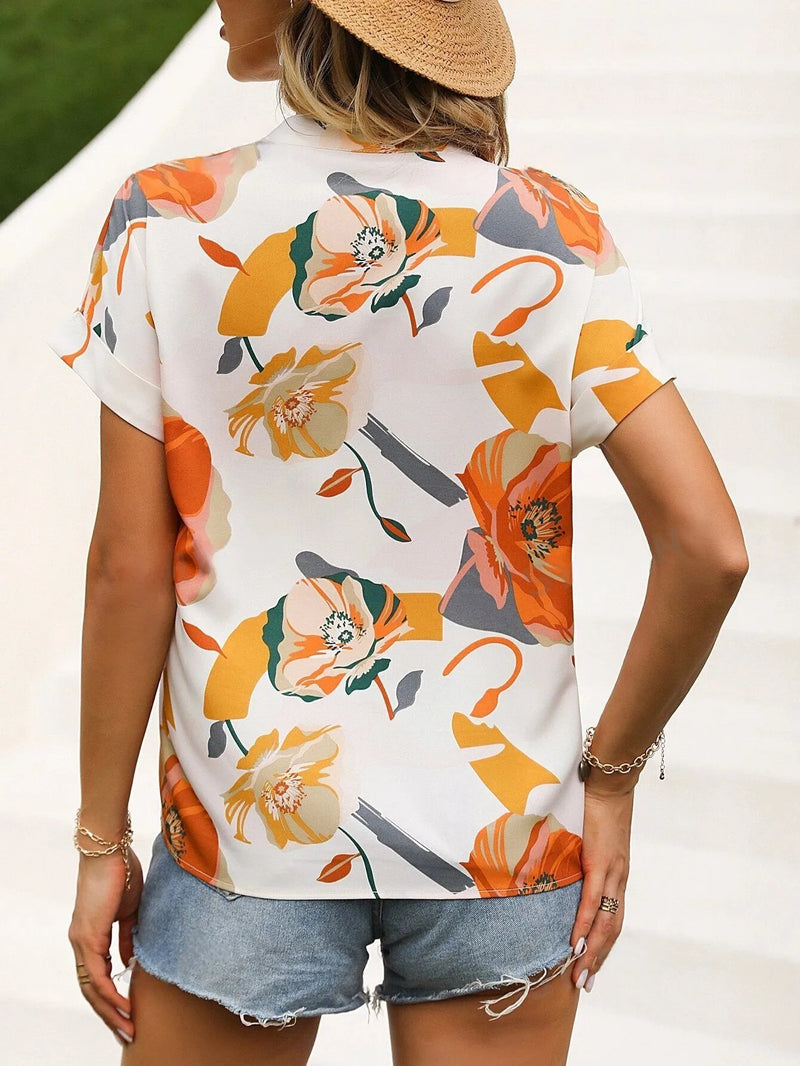 Blusa Feminina com Estampa Floral, Decote em V e Manga Morcego